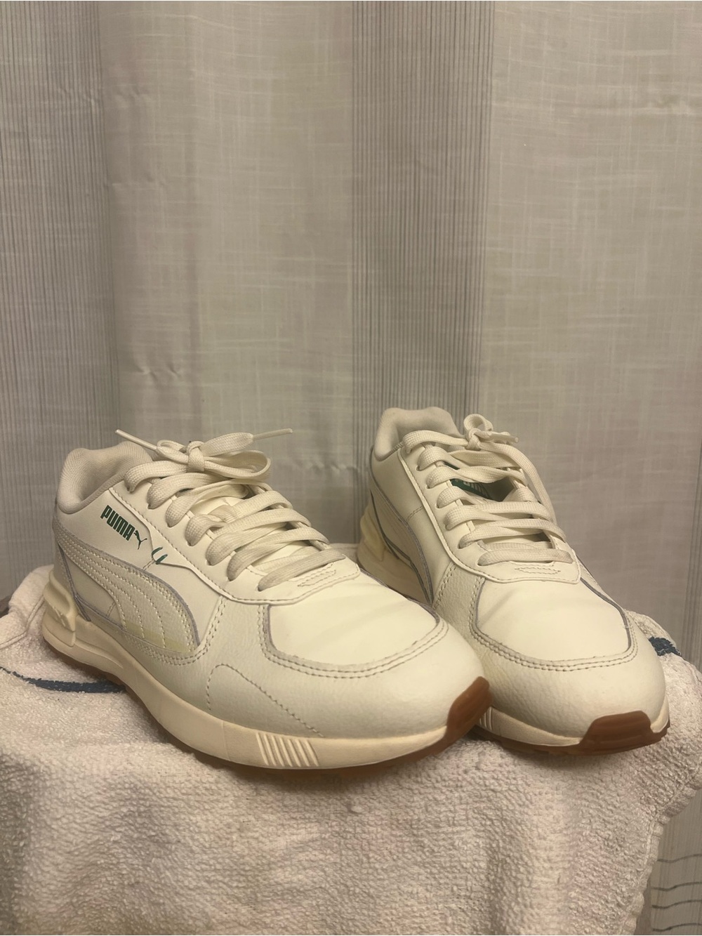 PUMA Graviton Lifestyle sneakers in cream & white color-way with green accents!